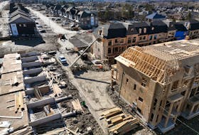 Townhouses under construction are seen in a subdivision in King City, Ontario, Canada April 2, 2023.