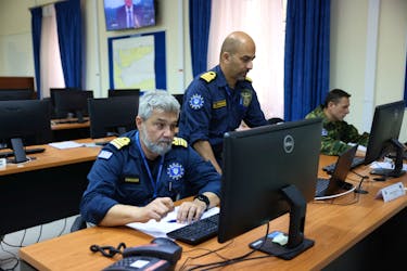 Personnel of the European Union's naval mission "Aspides" work at their headquarters in Larissa, Greece, April 16, 2024.