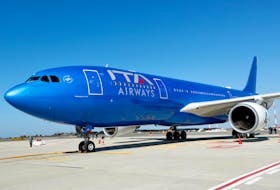 One of state-owned Italian carrier ITA Airways' planes with new blue livery is seen at Fiumicino airport before a news conference to present the airline's new fleet, in Rome, Italy, March 1, 2022.