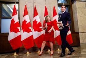 Canada's Deputy Prime Minister and Minister of Finance Chrystia Freeland and Prime Minister Justin Trudeau walk together before delivering the fall economic statement in Ottawa, Canada, November 21, 2023.