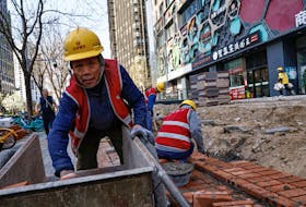 A worker labours at a construction site in Beijing, China April 9, 2024.