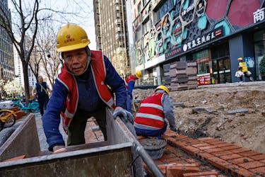 A worker labours at a construction site in Beijing, China April 9, 2024.