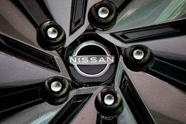 The logo of Nissan Motor is seen on a car wheel at the automaker's showroom in Tokyo, Japan, Nov. 11, 2020.