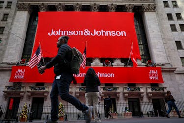 A Johnson & Johnson banner is displayed on the front of the New York Stock Exchange (NYSE) in New York City, in New York City, U.S., December 5, 2023. 