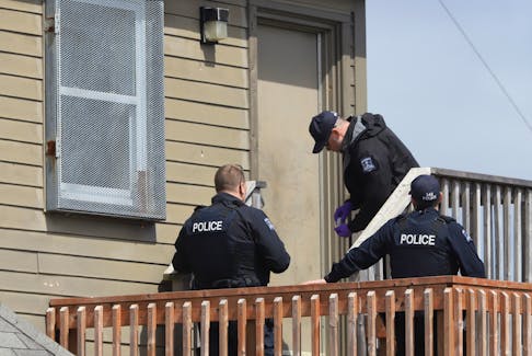 Members of the Halifax regional police forensics gather evidence behind the mainland common ballfield scoreboard house l/storage building in Halifax Monday April 15, 2024. Halifax Regional Police is investigating a stabbing that occurred today in Halifax.
 
At approximately 11:45 a.m. officers responded to a report of an injured person in the area of the 300 block of Lacewood Drive. A youth had been stabbed by another youth, and the suspect fled the area on foot. The victim was taken to hospital for treatment of non-life-threatening injuries.

TIM KROCHAK PHOTO