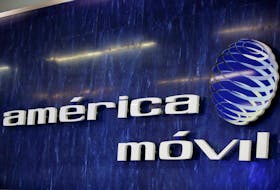 The logo of America Movil is pictured on the wall at a reception area in the company's corporate offices, in Mexico City, Mexico January 25, 2022.