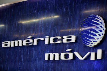 The logo of America Movil is pictured on the wall at a reception area in the company's corporate offices, in Mexico City, Mexico January 25, 2022.