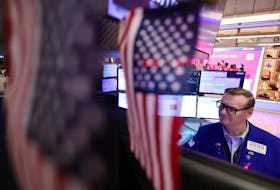 A trader works on the trading floor at the New York Stock Exchange (NYSE) in New York City, U.S., April 4, 2024.