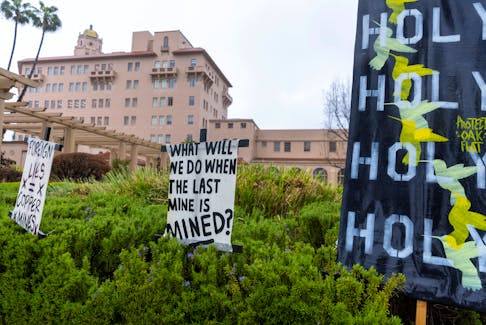 File photo: Apache Stronghold, a Native American group hoping to protect their sacred land from a Cooper mine in Arizona, place signs outside the 9th Circuit Appeal Court in Pasadena, California,U.S., March 21, 2023.       