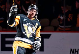 Apr 15, 2024; Pittsburgh, Pennsylvania, USA;  Pittsburgh Penguins center Sidney Crosby (87) waves to the crowd after being named first star of the game against the Nashville Predators at PPG Paints Arena. The Penguins won 4-2. Mandatory Credit: Charles LeClaire-USA TODAY Sports