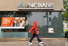 A person walks past a branch of PNC Bank, a subsidiary of PNC Financial Services Group, in Washington, U.S. April 30, 2023. 