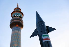 A model of a missile is seen during a celebration following the IRGC attack on Israel, in Tehran, Iran, April 15, 2024. Majid Asgaripour/WANA (West Asia News Agency) via
