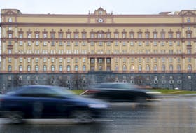 Cars drive past the headquarters of the Federal Security Service (FSB) in central Moscow, Russia, November 10, 2015.