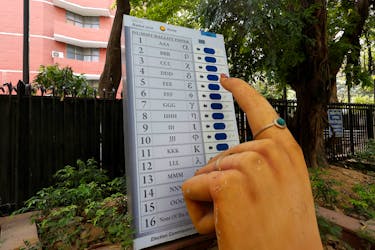 A model of Electronic Voting Machine (EVM) is displayed outside the office of the Election Commission of India, ahead of the country's general election, in New Delhi, India, April 15, 2024.