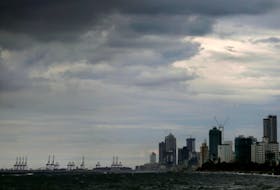 A general view of the main business district as rain clouds gather above in Colombo, Sri Lanka, November 17, 2020.