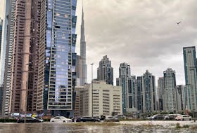 A general view of floods caused by heavy rains, with the Burj Khalifa tower visible in the background, in Dubai, United Arab Emirates, April 16, 2024.