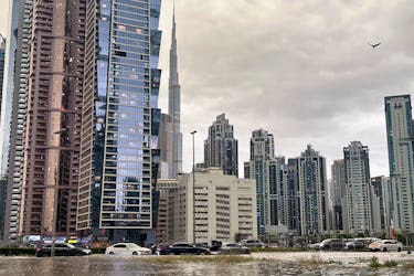 A general view of floods caused by heavy rains, with the Burj Khalifa tower visible in the background, in Dubai, United Arab Emirates, April 16, 2024.