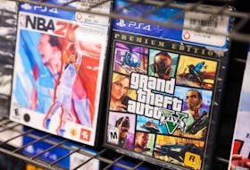 NBA 2K22 and Grand Theft Auto 5 by Take-Two Interactive Software Inc are seen for sale in a store in Manhattan, New York City, U.S., February 7, 2022.