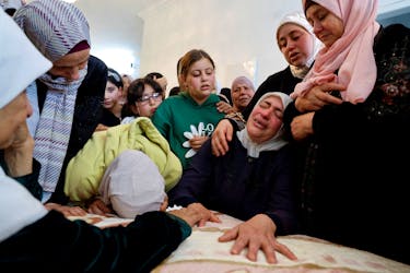 Mourners react during the funeral of Palestinian Yazan Ishtayeh, who was killed in an Israeli raid, in Salim, near Nablus, in the Israeli-occupied West Bank April 15, 2024.