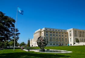 A U.N. flag waves outside the United Nations European headquarters in Geneva, Switzerland May 22, 2019. 