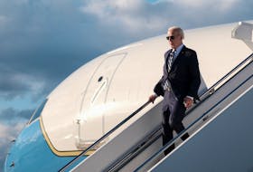 U.S. President Joe Biden disembarks from Air Force One at Dover Air Force Base, in Dover, Delaware, U.S., April 12, 2024.