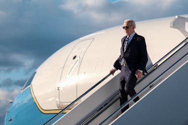 U.S. President Joe Biden disembarks from Air Force One at Dover Air Force Base, in Dover, Delaware, U.S., April 12, 2024.