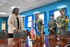 U.S. Ambassador to the United Nations Linda Thomas-Greenfield listens to military officers in the conference building of United Nations Command Military Armistice Commission (UNCMAC) during a visit to the south side of the truce village of Panmunjom in the Demilitarized Zone (DMZ) dividing the two Koreas, South Korea, April 16, 2024.  JUNG YEON-JE/Pool via REUTERS