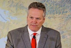 Republican Alaska Governor Mike Dunleavy attends a news conference at his office in Anchorage, Alaska, U.S. March 22, 2022.