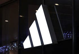 File photo: Logo of Adidas brand is displayed on the store in the center of Warsaw, Poland, January 4, 2024.