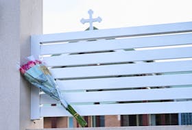 Flowers are laid outside the Assyrian Christ The Good Shepherd Church after a knife attack took place during a service the night before, in Wakeley in Sydney, Australia, April 16, 2024.