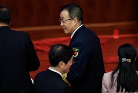 Chinese Defense Minister Dong Jun arrives for the closing session of the National People's Congress (NPC) at the Great Hall of the People in Beijing, China March 11, 2024.