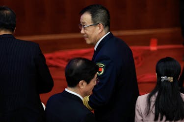 Chinese Defense Minister Dong Jun arrives for the closing session of the National People's Congress (NPC) at the Great Hall of the People in Beijing, China March 11, 2024.