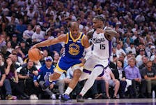 Apr 16, 2024; Sacramento, California, USA; Golden State Warriors guard Chris Paul (3) dribbles the ball next to Sacramento Kings guard Davion Mitchell (15) in the second quarter during a play-in game of the 2024 NBA playoffs at the Golden 1 Center. Mandatory Credit: Cary Edmondson-USA TODAY Sports