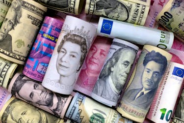 Euro, Hong Kong dollar, U.S. dollar, Japanese yen, pound and Chinese 100 yuan banknotes are seen in this picture illustration, January 21, 2016.  