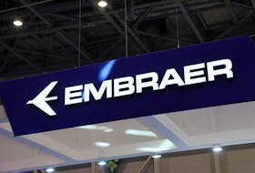 An Embraer logo is pictured during the European Business Aviation Convention & Exhibition (EBACE) in Geneva, Switzerland, May 23, 2022.