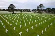 A drone view shows the World War II Normandy American Cemetery and Memorial at Colleville-sur-Mer, situated above Omaha Beach, Normandy region, France, April 11, 2024.