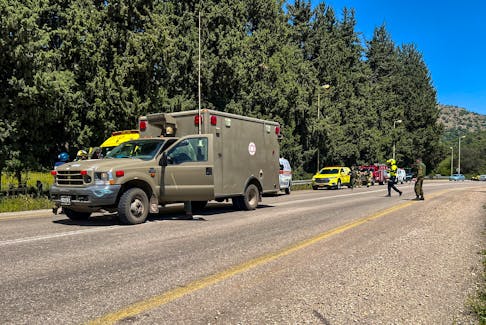 Emergency response forces work after it was reported that people were injured, amid ongoing cross-border hostilities between Hezbollah and Israeli forces, near Arab al-Aramashe in northern Israel April 17, 2024.