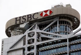 A logo of HSBC is seen on its headquarters at the financial Central district in Hong Kong, China August 4, 2020.