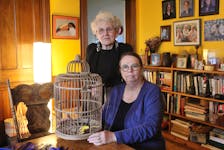 Jeanne Sarson, left, and Linda MacDonald are the co-founders of Persons Against Non-State Torture. They explain torture as a bird strapped to a cage by an invisible length of string. While torture victims may be able to fly out of their cage momentarily, they are limited in how far they can go, and they ultimately must return to the cage. Brendyn Creamer