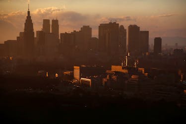 High-rise buildings are seen at the Shinjuku business district during sunset in Tokyo, Japan, March 7, 2017.