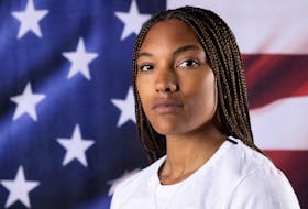 American track and field athlete Tara Davis-Woodhall poses for a portrait during the Team USA media summit ahead of the Paris Olympics and Paralympics, at an event in New York, U.S., April 16, 2024.