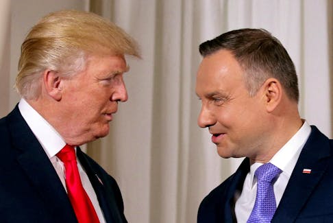 U.S. President Donald Trump is greeted by Polish President Andrzej Duda in Warsaw, Poland, July 6, 2017.