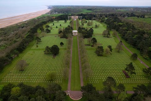 A drone view shows the World War II Normandy American Cemetery and Memorial at Colleville-sur-Mer, situated above Omaha Beach, Normandy region, France, April 11, 2024.