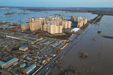 A drone view shows a flooded area around the Dubki residential complex in Orenburg, Russia, April 12, 2024.