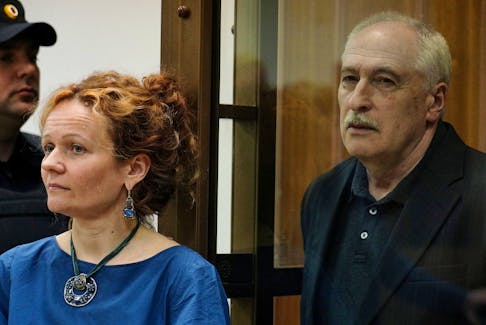 Valery Golubkin, a professor at the Moscow Institute of Physics and Technology, accused of treason, and his lawyer Maria Eismont attend a court hearing in Moscow, Russia June 26, 2023.