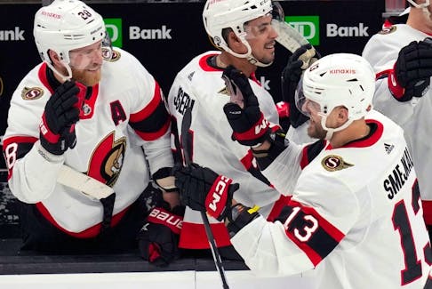 Ottawa Senators left-winger Jiri Smejkal is congratulated after scoring his first NHL goal against the Boston Bruins during the second period on Tuesday night.