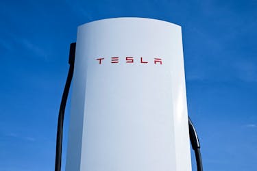 A detail of a Tesla electric vehicle charging station is pictured on a car park of the A10 shopping center in Wildau near Berlin, Germany, March 20, 2024.