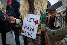 Protesters gather outside the United Nations headquarters in response to the decision by the United States to defund the United Nations Relief and Works Agency for Palestine Refugees (UNRWA) in New York City, U.S., January 31, 2024.