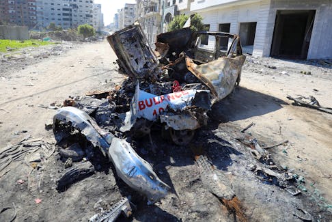 Wreckage of an ambulance used by two workers who were killed while they went  to save Palestinian girl Hind Rajab, 6, who begged Gaza rescuers to send help while  being trapped by Israeli military fire, after Hind’s body was found in a car along with the bodies of five of her family members, amid the ongoing conflict between Israel and Hamas, is seen in Gaza City, February 10, 2024.
