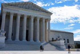 People visit the U.S. Supreme Court building  in Washington, U.S., August 31, 2023.